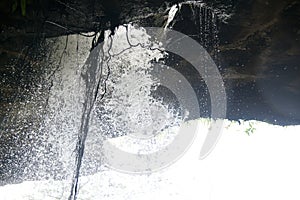 Sang Chan Waterfall is sometimes called Namtok Long Ru Waterfall Through a Hole .