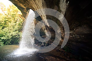 Sang Chan Waterfall is sometimes called Namtok Long Ru Waterfall Through a Hole .