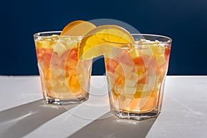 Sangria cocktail with white wine and fresh fruit