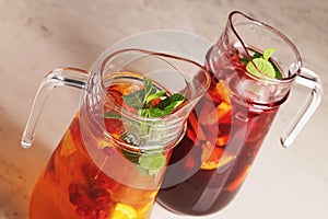 Sangria with red and white wine in a pitcher