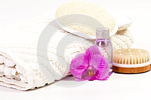 Sanitary accessories and pink orchid.