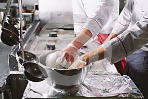 Sanitary day in the restaurant. Repeats wash your workplace. Cooks wash oven, stove and extractor in the Restaurant.