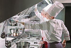 Sanitary day in the restaurant. Repeats wash your workplace. Cooks wash oven, stove and extractor in the Restaurant.