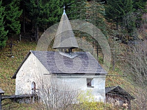 The Sankt Martin chapel above the reservoir lake Gigerwaldsee or chapel of St. Martin in the UNESCO World Heritage Tectonic Arena