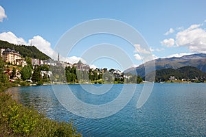 Sankt Moritz town and lake, blue sky in Switzerland photo