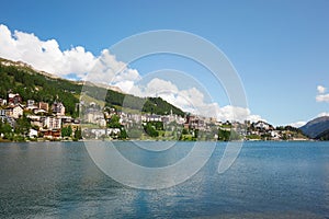 Sankt Moritz town and lake in summer, sunlight in Switzerland photo