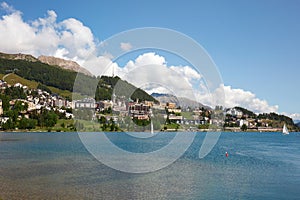 Sankt Moritz town and lake in a sunny day in Switzerland photo
