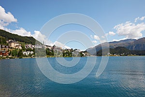 Sankt Moritz town and lake, wide angle view in a sunny summer day in Switzerland photo