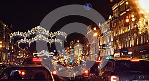 Sankt-Petersburg city night streetlight illuminated cars road sky outdoors garland lights