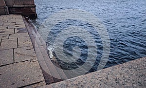 Sankt-Petersburg river embankment water wave stones stairs