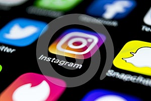 Instagram application icon on Apple iPhone X smartphone screen close-up. Instagram app icon. Social media icon. Social network