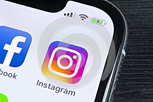 Instagram application icon on Apple iPhone X smartphone screen close-up. Instagram app icon. Social media icon. Social network