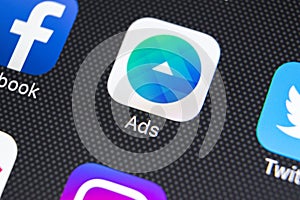 Facebook Ads application icon on Apple iPhone X screen close-up. Facebook Business app icon. Facebook Ads mobile application.