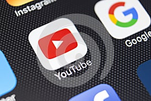 YouTube application icon on Apple iPhone 8 smartphone screen close-up. Youtube app icon. YouTube is an online video networking