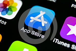 Apple store application icon on Apple iPhone X smartphone screen close-up. Mobile application icon of app store. Social network. A
