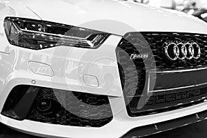 Front view of a modern luxury blue sport car Audi RS 6 Avant Quattro 2017. Car exterior details. Black and white.