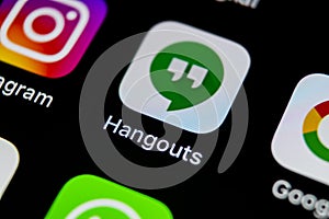 Google Hangouts application icon on Apple iPhone X smartphone screen close-up. Google hangouts app icon. Social network. Social me