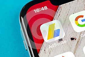 Google AdSense application icon on Apple iPhone X screen close-up. Google AdSense app icon. Google AdSense application. Social med