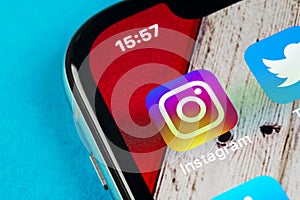 Instagram application icon on Apple iPhone X smartphone screen close-up. Instagram app icon. Social media icon. Social network