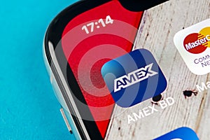 Amex application icon on Apple iPhone X smartphone screen close-up. Amex app icon. American express is an online electronic financ