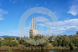 Sant AdriÃ¡, Central Thermal Station of Fecsa in Badalona, Barcelona, Spain. Abandoned boiler room with three chimneys