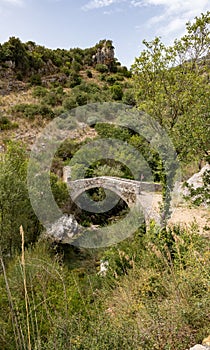 Sant Angelo in Fasanella Italy. View of the medieval stone humpback bridge over the sources of Auso. Ancient communication route