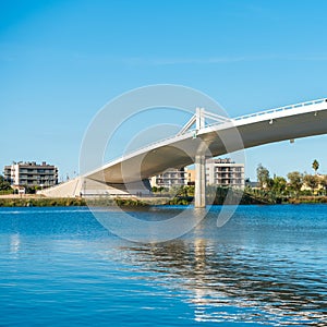 Sant Jaume d`Enveja new bridge `Lo Passador` over Ebro river Ebro Delta, Tarragona, Catalonia, Spain. Copy space for text.