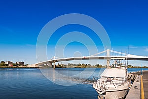 Sant Jaume d`Enveja new bridge `Lo Passador` over Ebro river Ebro Delta, Tarragona, Catalonia, Spain. Copy space for text.