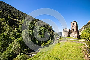 Sant Joan de Caselles Canillo, Andorra with beautiful hills surrounding it. Romanesque church build in the 12th century