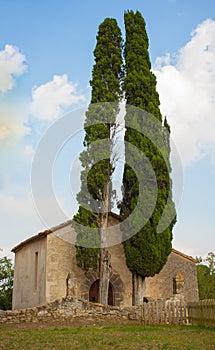 Sant Miquel del Castell chapel with cypress trees