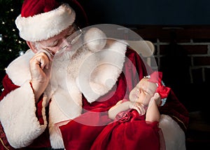 Santa and baby sleeping