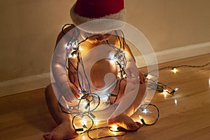 Santa baby and white lights