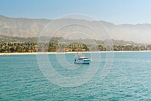 Santa Barbara Seashore at Morning. Beautiful Beach with Palm Trees, and Mountains on a Horizon