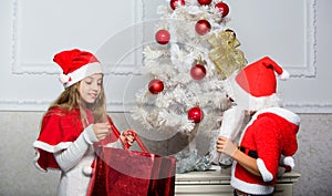 Santa bring christmas gift. Unpacking christmas presents. Reason children love christmas. Kids celebrate christmas with