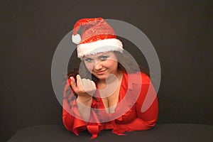 Santa calls a finger to itself
