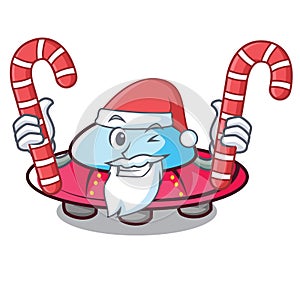 Santa with candy ufo mascot cartoon style