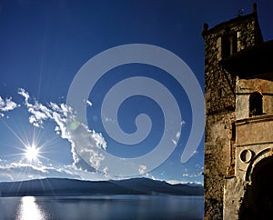 Santa Caterina bell tower and lake photo