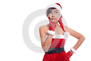 Santa christmas woman looking to the side thinking happy and playful. Asian christmas girl wearing santa hat and red sweater