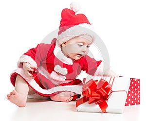 Santa Claus baby girl opening gift box