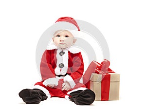 Santa Claus baby in red christmas clothes with gift box isolated on white