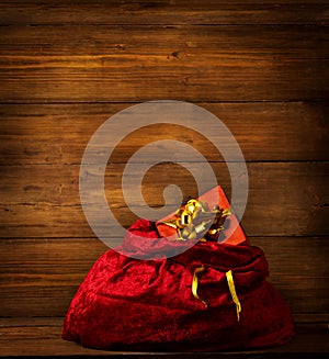 Santa Claus Bag, Christmas Red Sackful, Brown Wooden Background