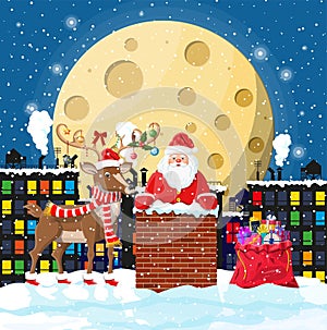 Santa claus with bag with gifts in house chimney