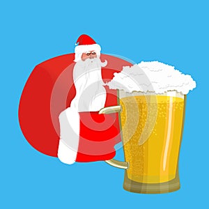 Santa Claus and beer. Christmas beer mug. New Year alcohol