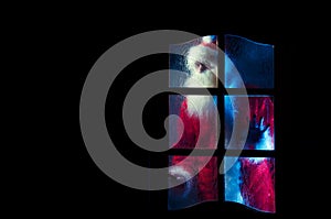 Santa Claus behind the glass door