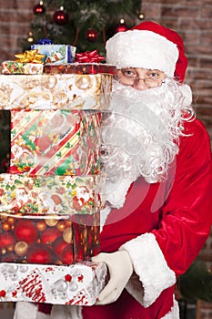 Santa Claus brings Christmas gifts