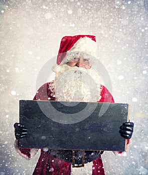 Santa Claus with chalkboard