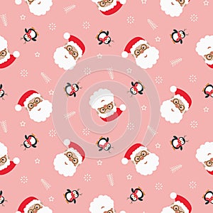 Santa Claus Christmas seamless pattern. Pink background with penguins and Santa heads