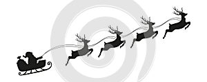 Santa claus in a christmas sleigh with reindeer silhouette