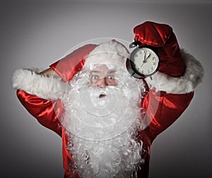 Santa Claus and a clock