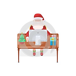 Santa Claus with a computer